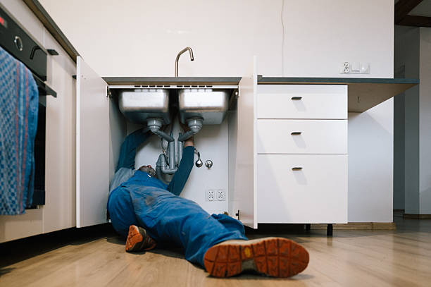 Professional Drain Cleaning technician working in West Kingston, RI